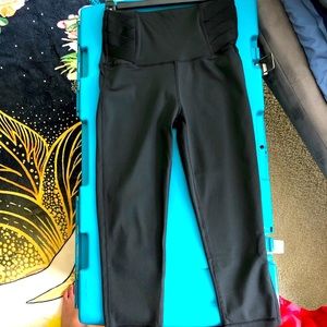 Black leggings with cross stitch elastic